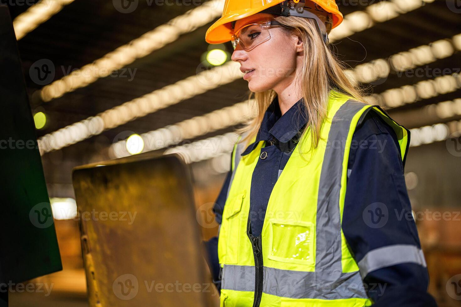 people with machinery equipment plant technology. smart industry worker operating. Factory engineer woman standing confident to control panel switch. Worker works at heavy machine at industry factory. photo