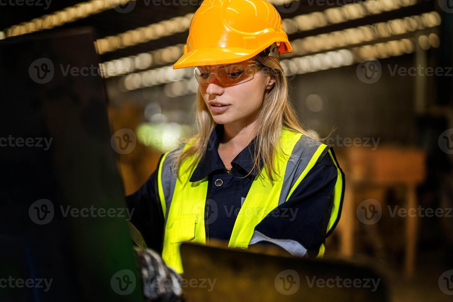 people with machinery equipment plant technology. smart industry worker operating. Factory engineer woman standing confident to control panel switch. Worker works at heavy machine at industry factory. photo