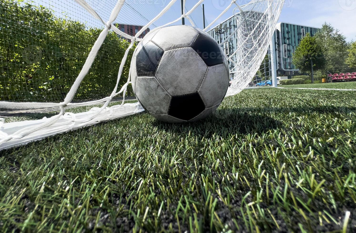 Goal in the back of net in soccer game photo