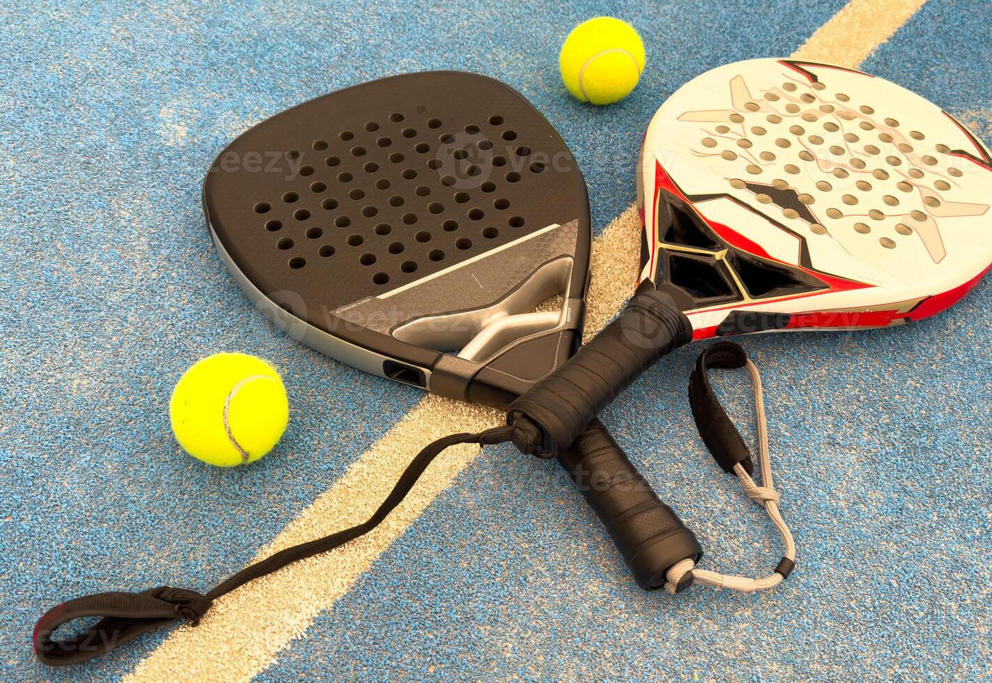 padel tennis racket sport court and balls photo