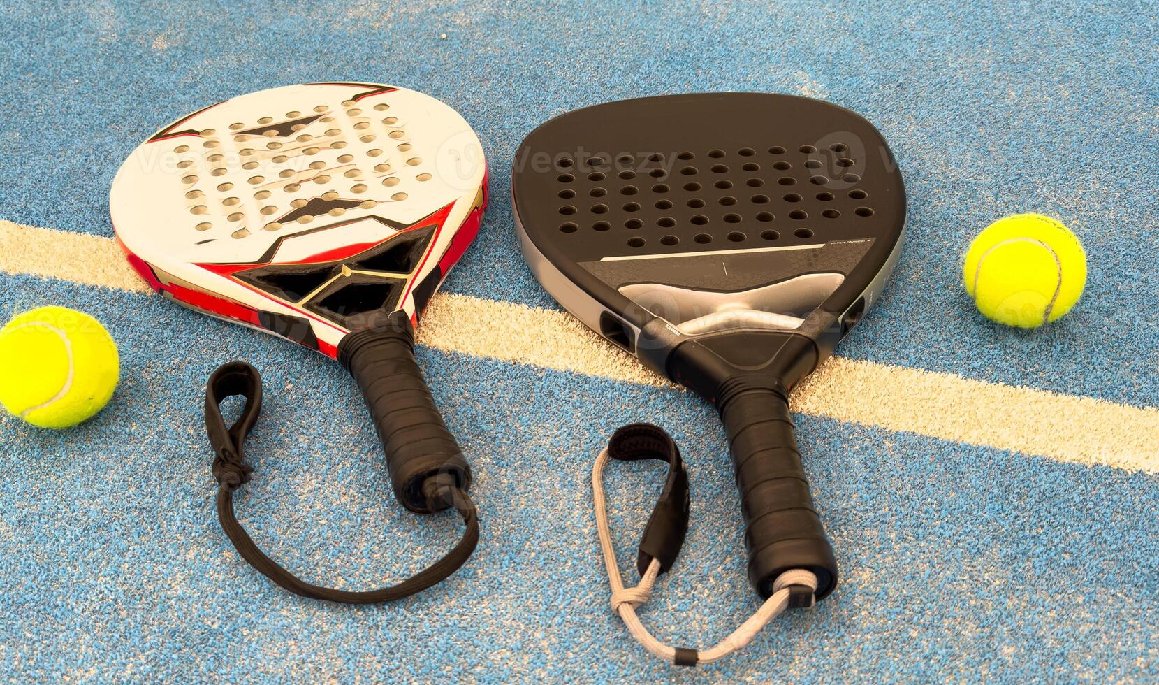 professional paddle tennis racket with natural lighting on court background. Horizontal sport theme poster, greeting cards, headers, website and app photo
