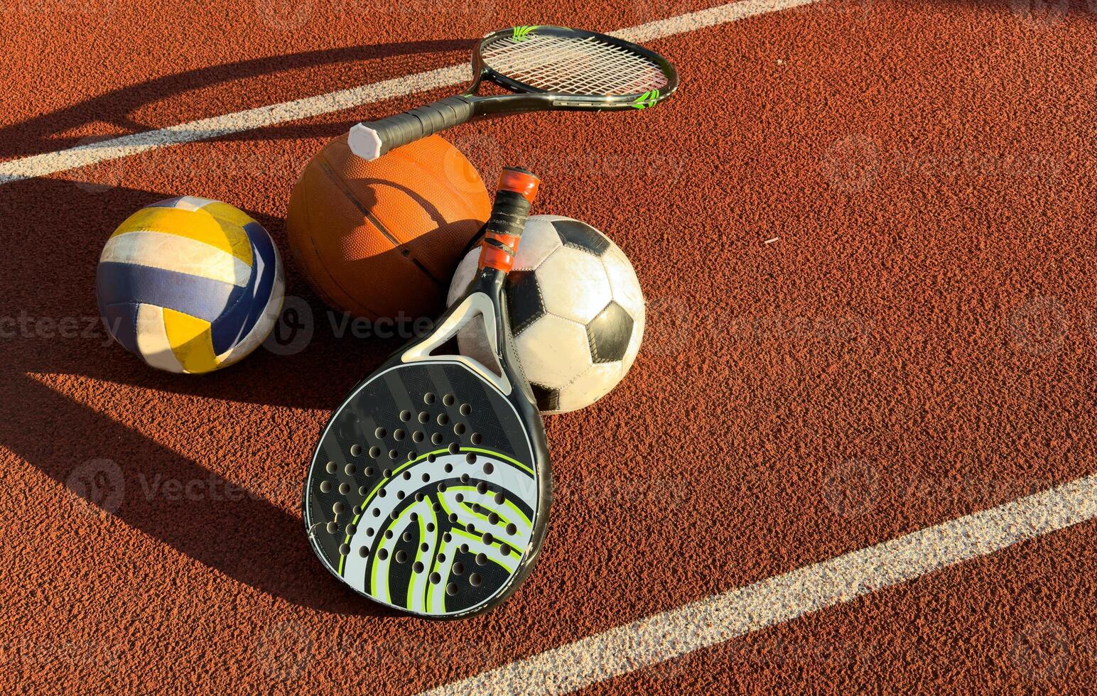 High Angle View Of Various Sport Equipments On playground photo