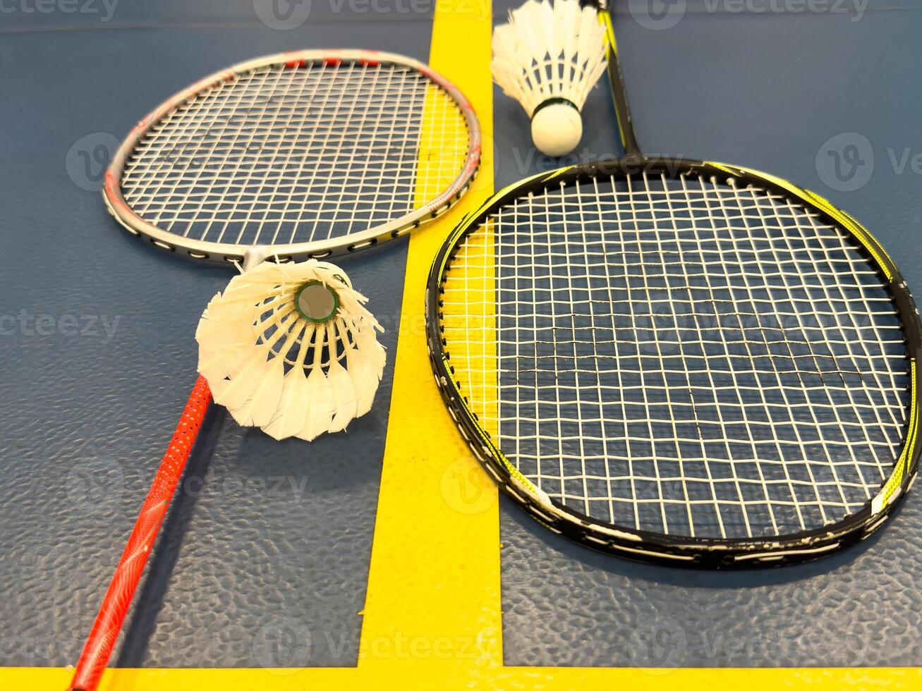 Racket and Shuttlecock with use sport or exercise on a black background. photo