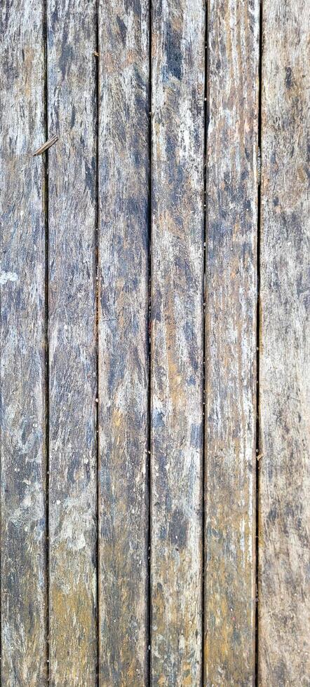 old slatted wood background with shadows photo