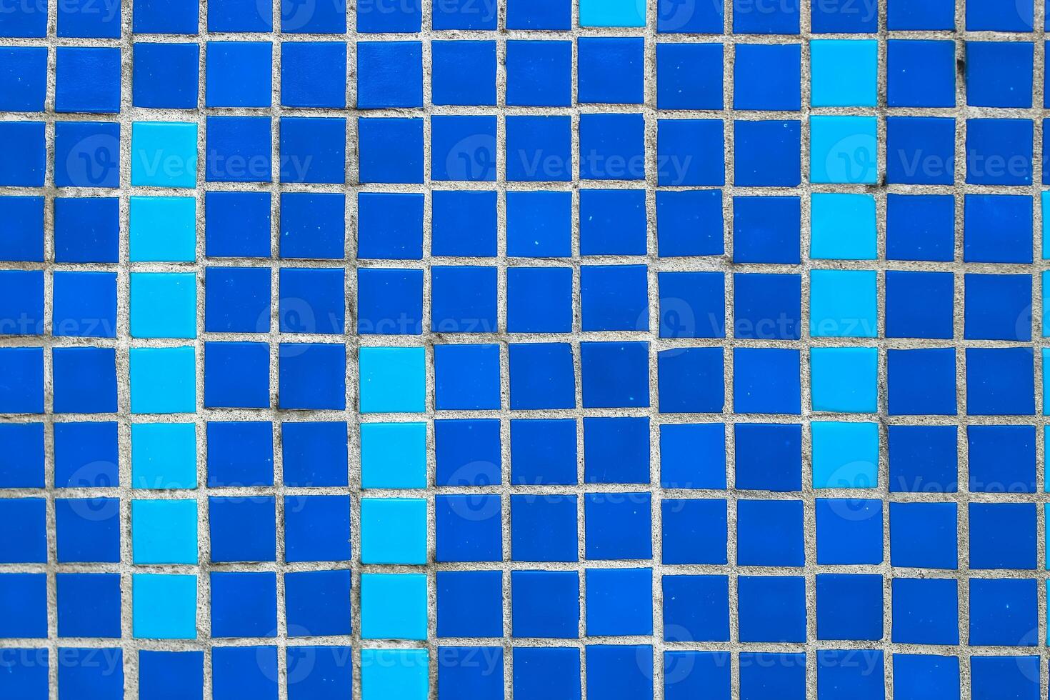 Texture of blue mosaic tiles, close-up photo