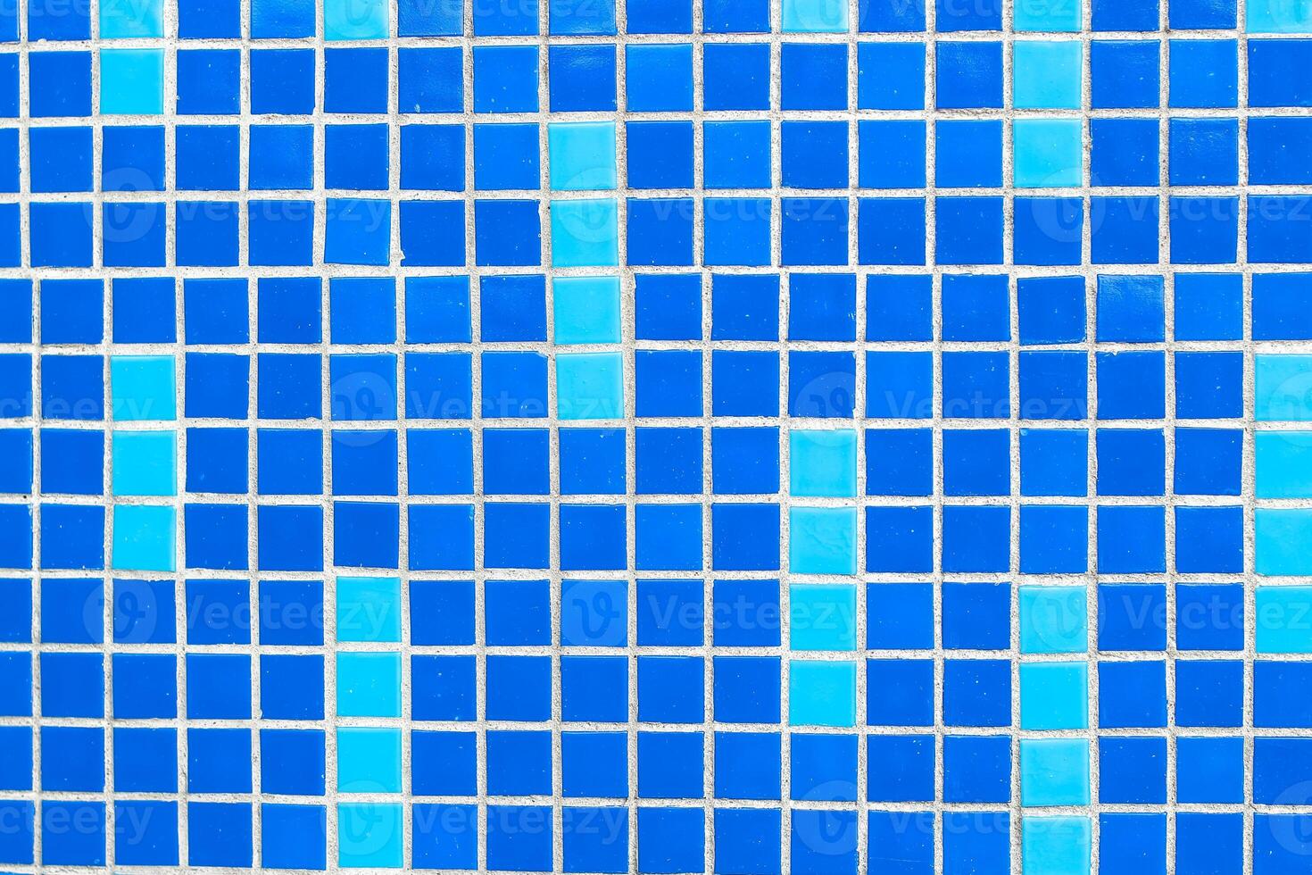 Texture of blue mosaic tiles, close-up photo