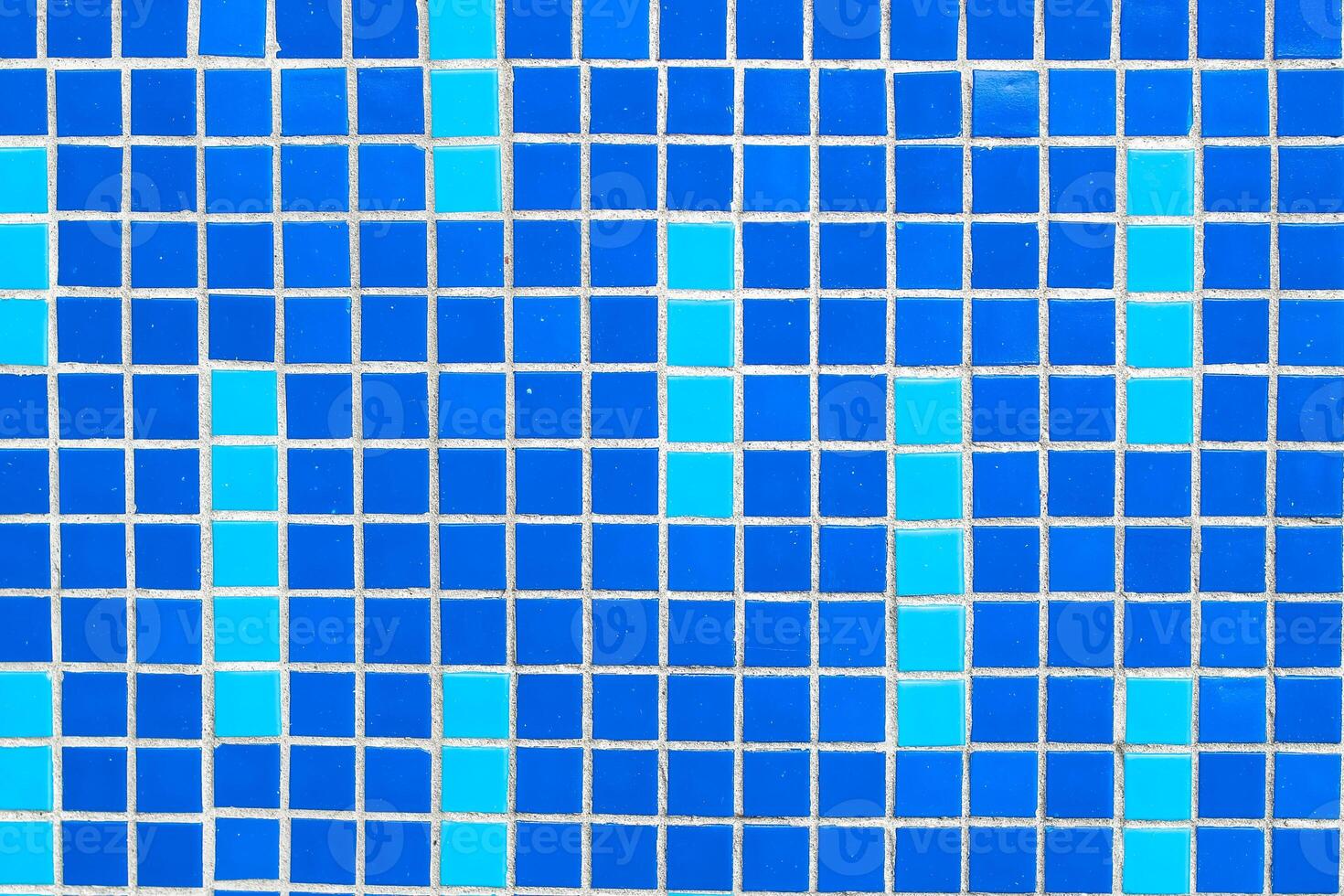 Texture of blue mosaic tiles, close-up photo