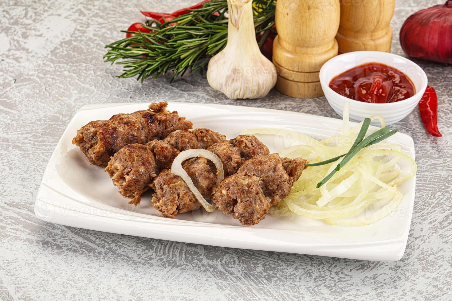 Beef kebab minced meat with onion photo