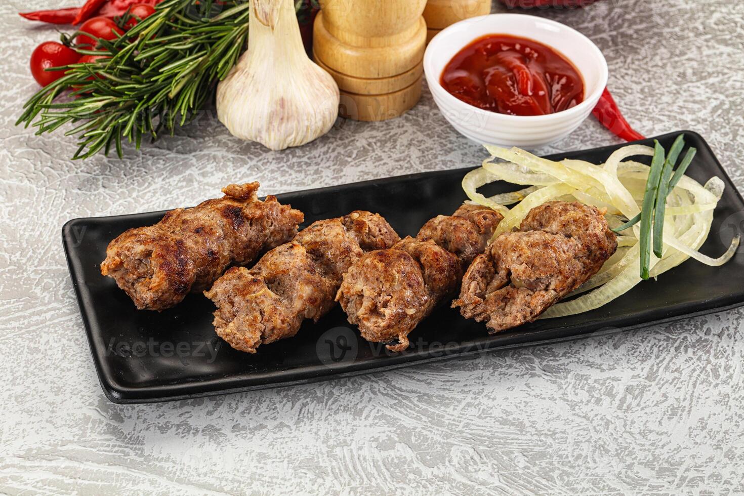 Beef kebab minced meat with onion photo