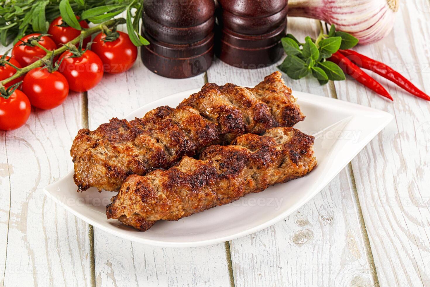 Chicken kebab minced meat and spices photo