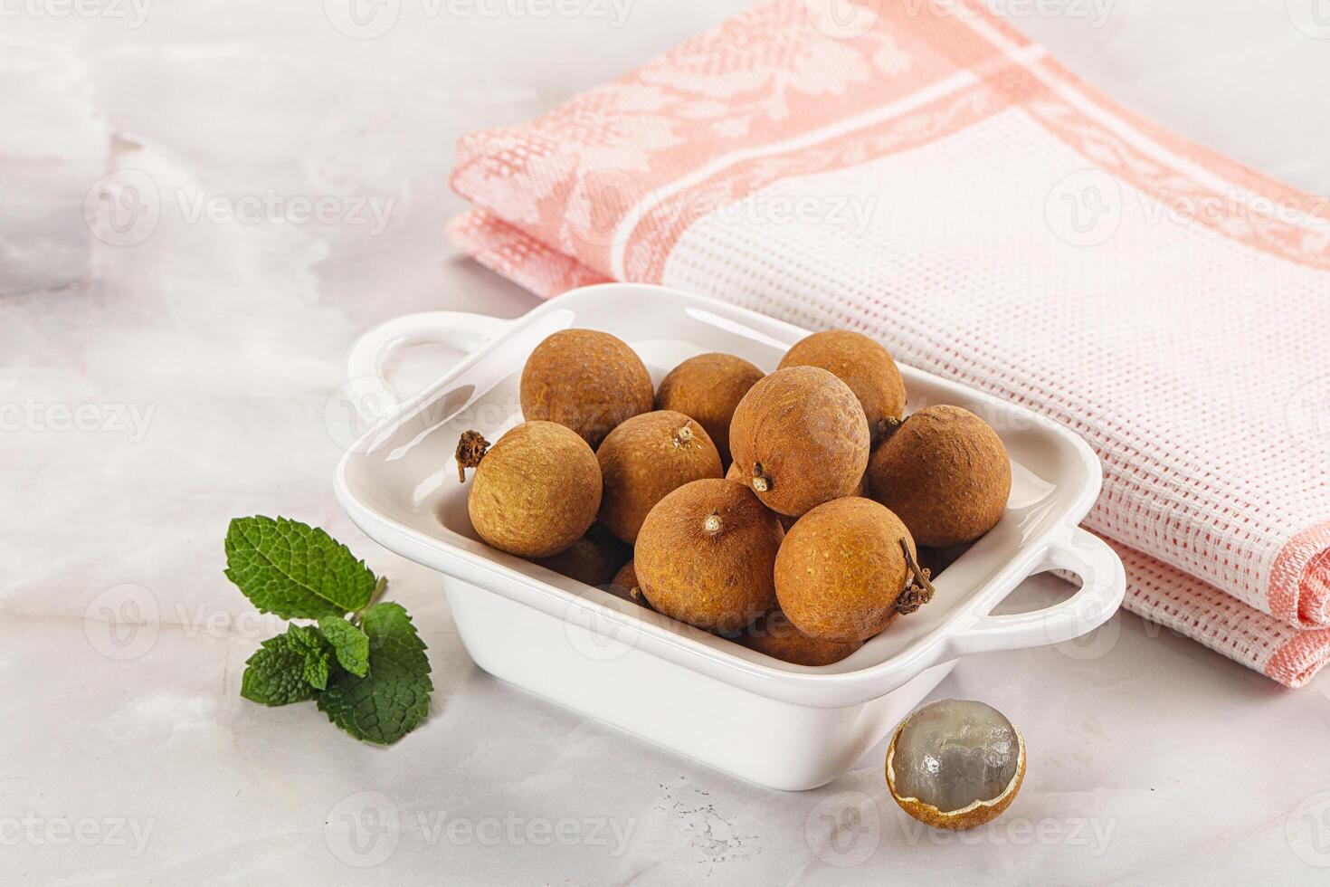 Tropical delicous fruit Longan heap photo