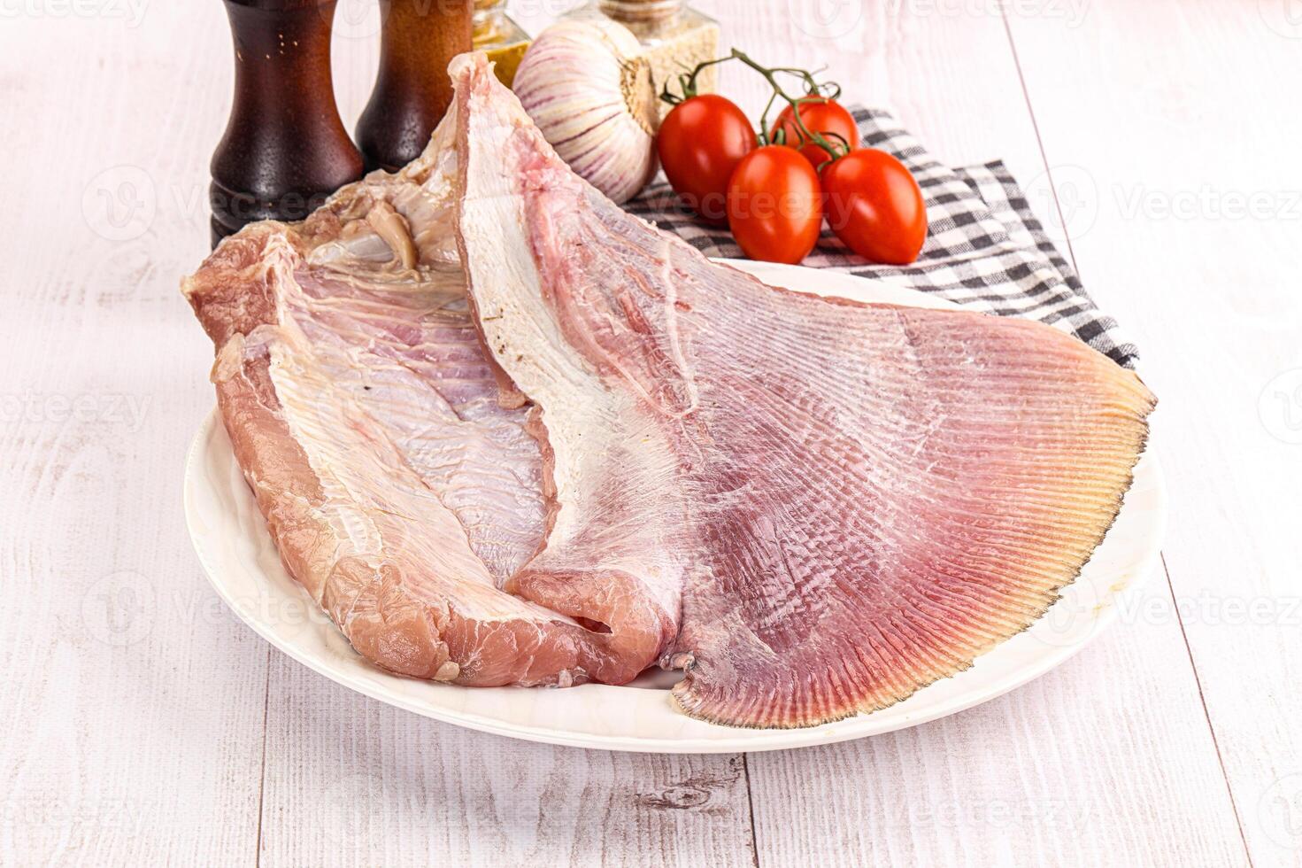 Raw uncooked stingray fish wing photo