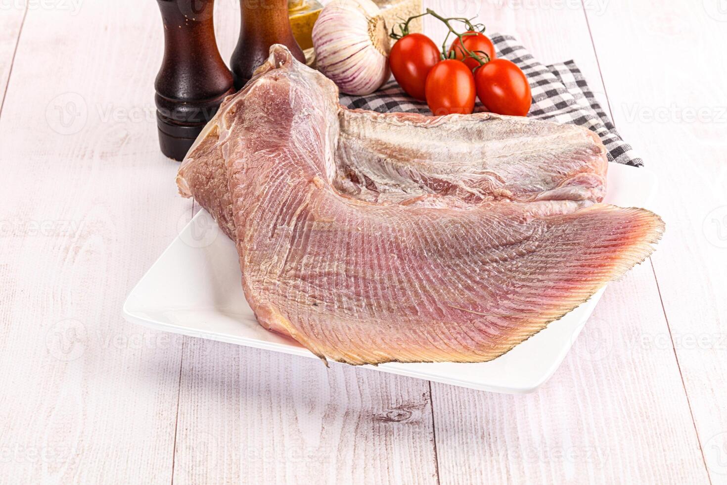 Raw uncooked stingray fish wing photo