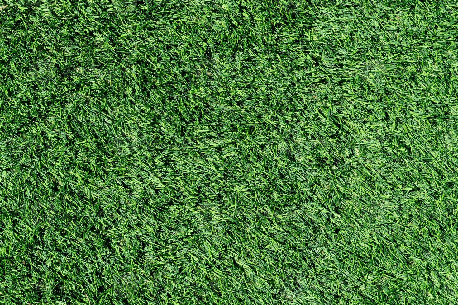 Above view of green Artificial grass. Used for decorating the garden around the house to remove weeds or for cleanliness. for background and textured. photo