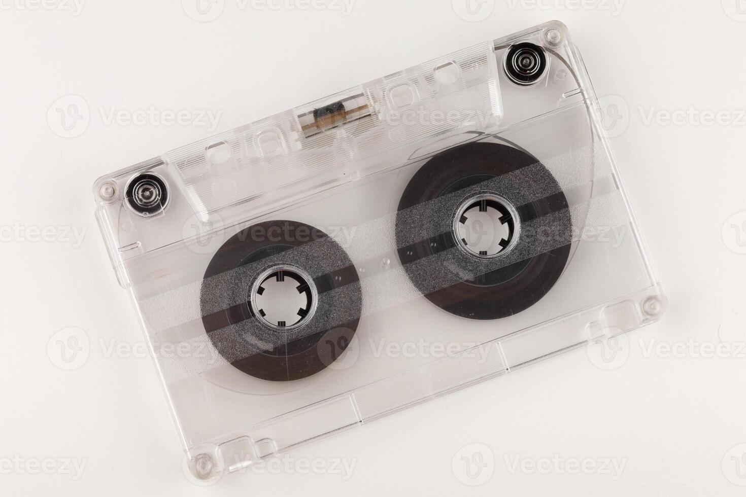 Old audio cassette on a white background close-up photo