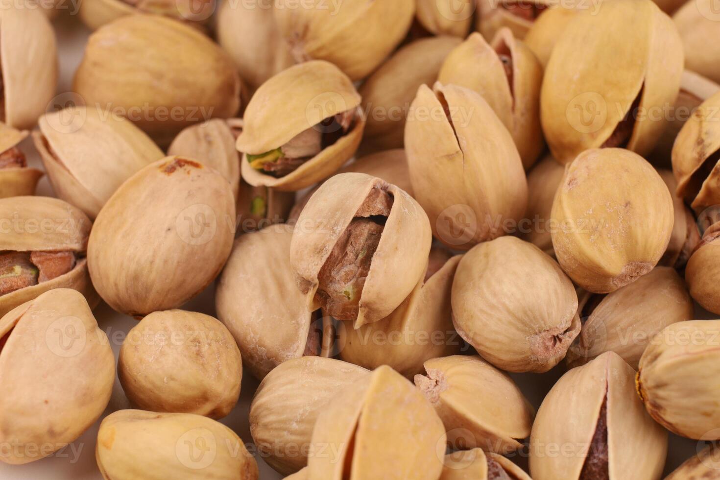 Pistachios are delicious nuts. Lots of healthy eating nuts photo