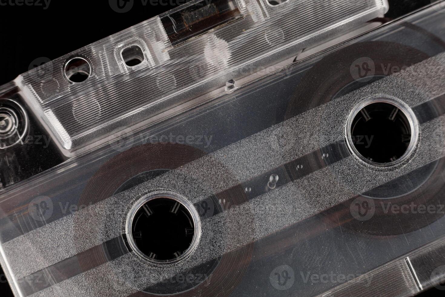 Old audio cassette on a black background close-up photo
