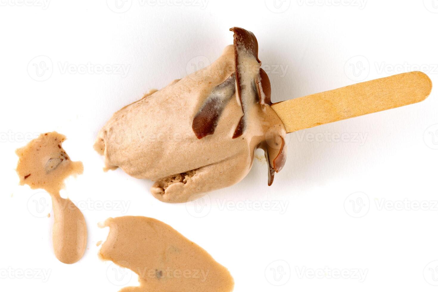 Chocolate ice cream on a stick melted photo