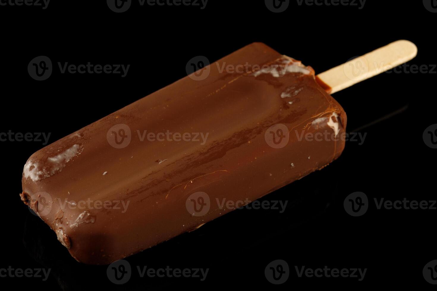 Chocolate ice cream on a stick photo