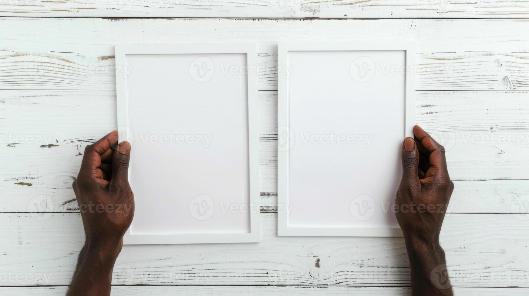 Hands Placing Blank Photo Frames on Wall for Mockup