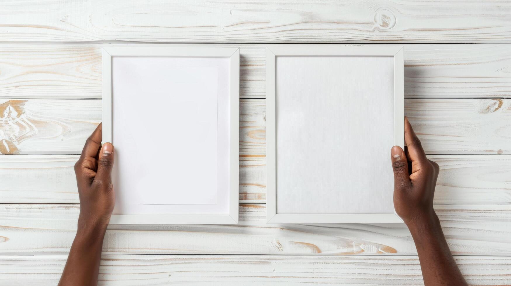 Hands Placing Blank Photo Frames on Wall for Mockup