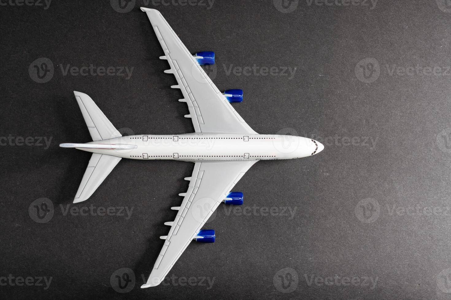 Model plane, airplane on dark background photo