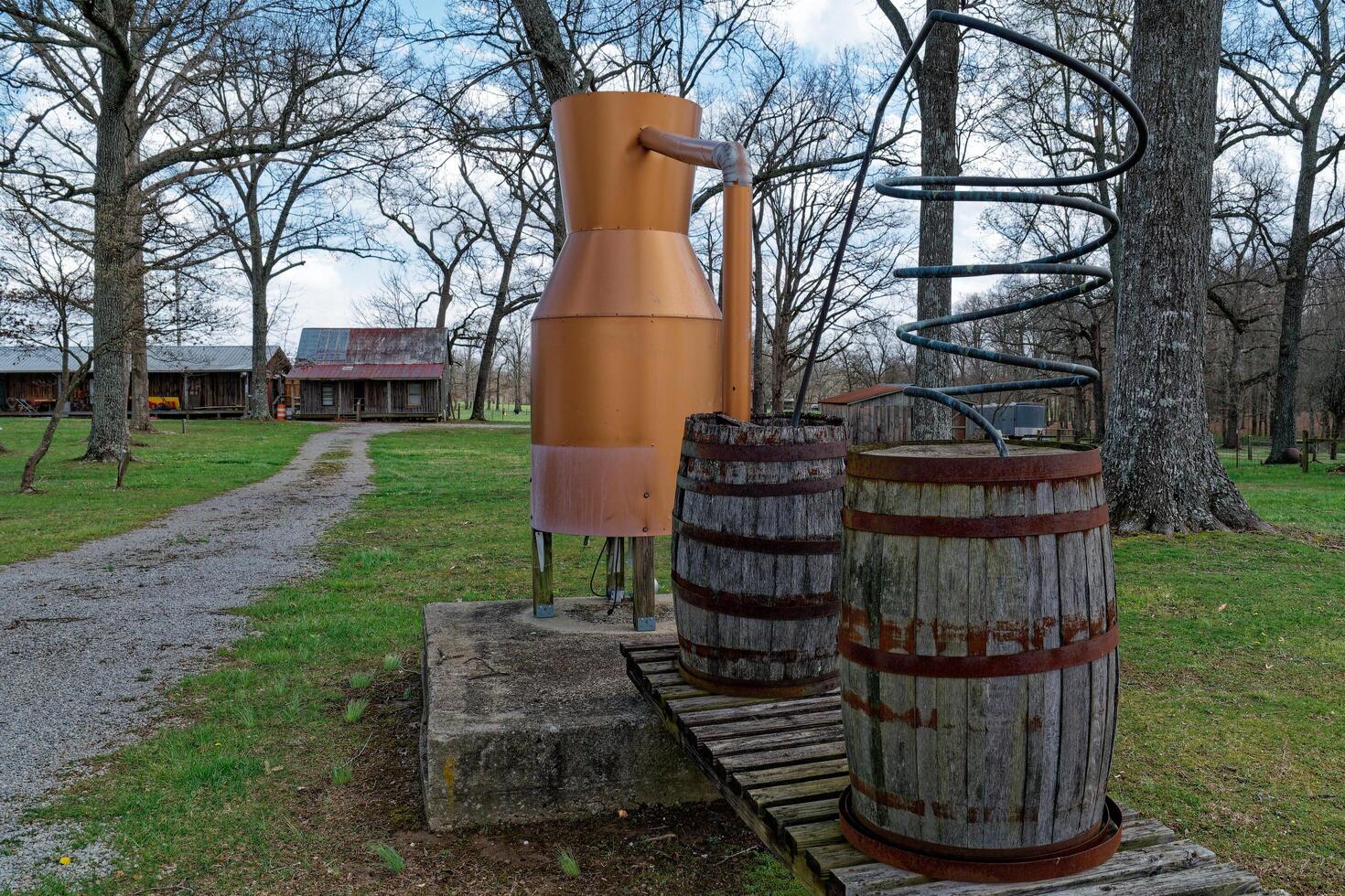 Reproduction moonshine still outdoors photo