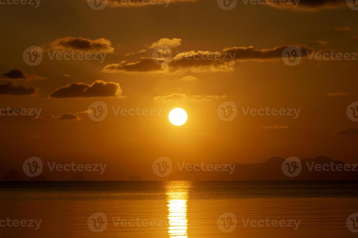 Sunset sky at the lake with clouds. photo