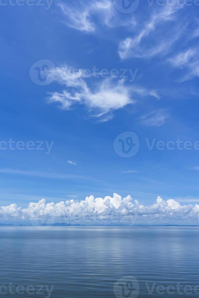 Blue sky background with white clouds on the lake. photo