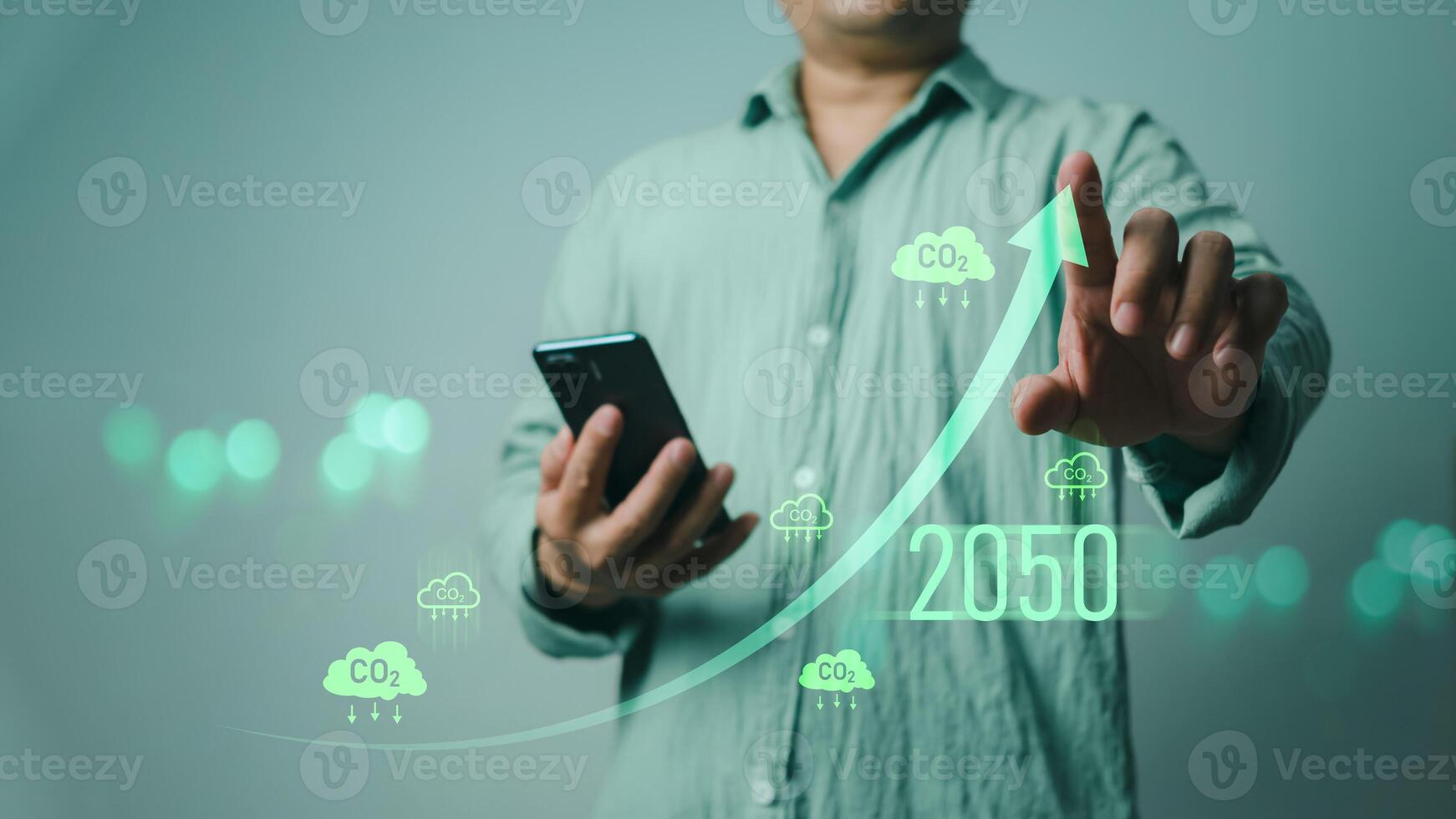 Carbon reduction and carbon credit to limit global warming from climate change, Businessman point to increasing arrow with carbon reduction for decrease CO2, Bio Circular Green Economy concept. photo