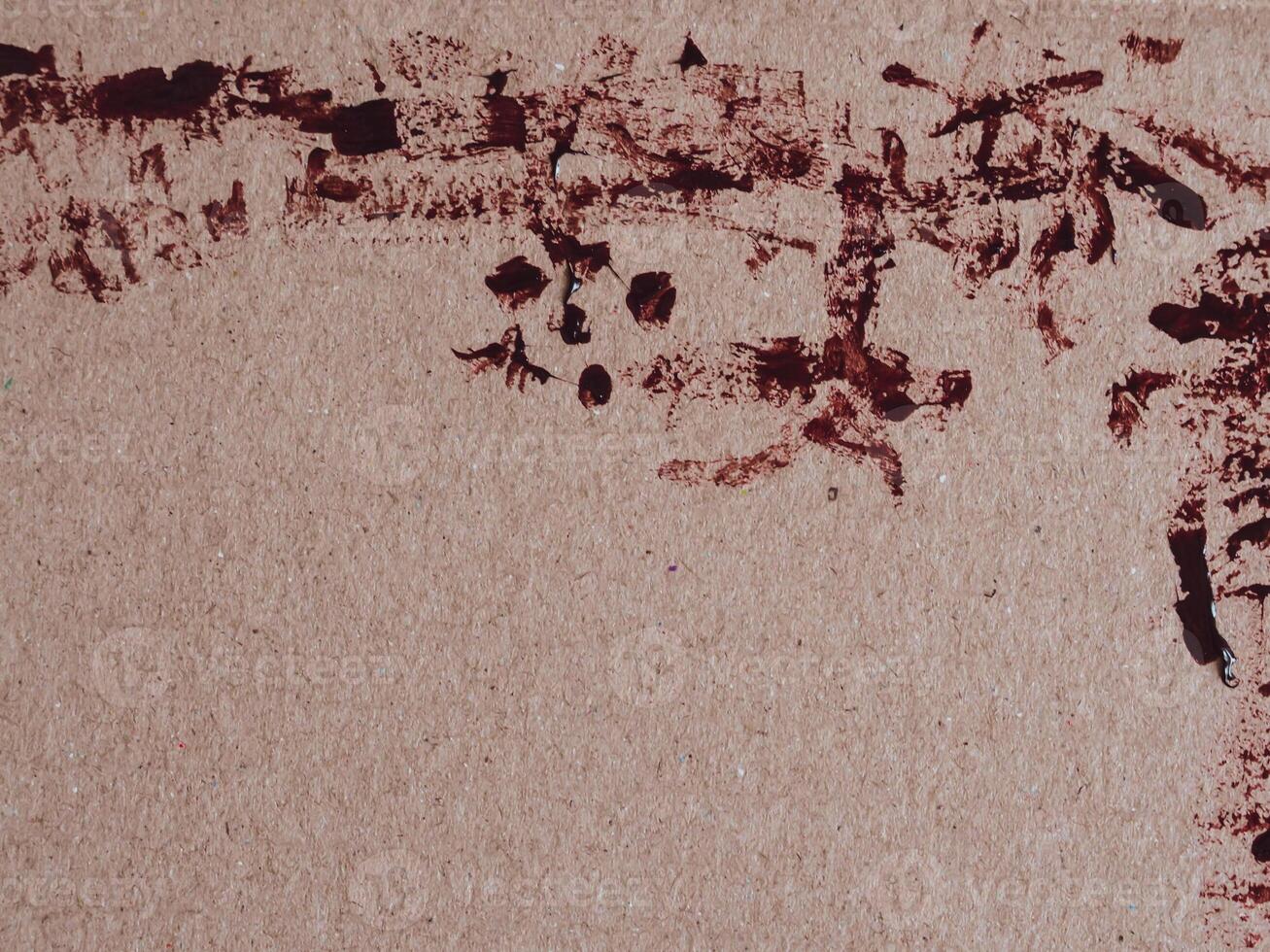 Paint on brown old paper for vintage background. photo
