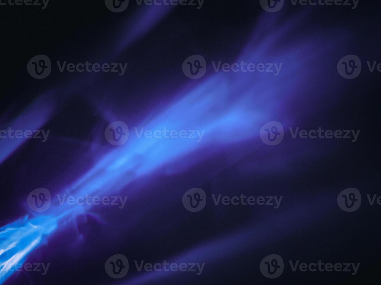 Purple glare in the dark for an abstract background. photo