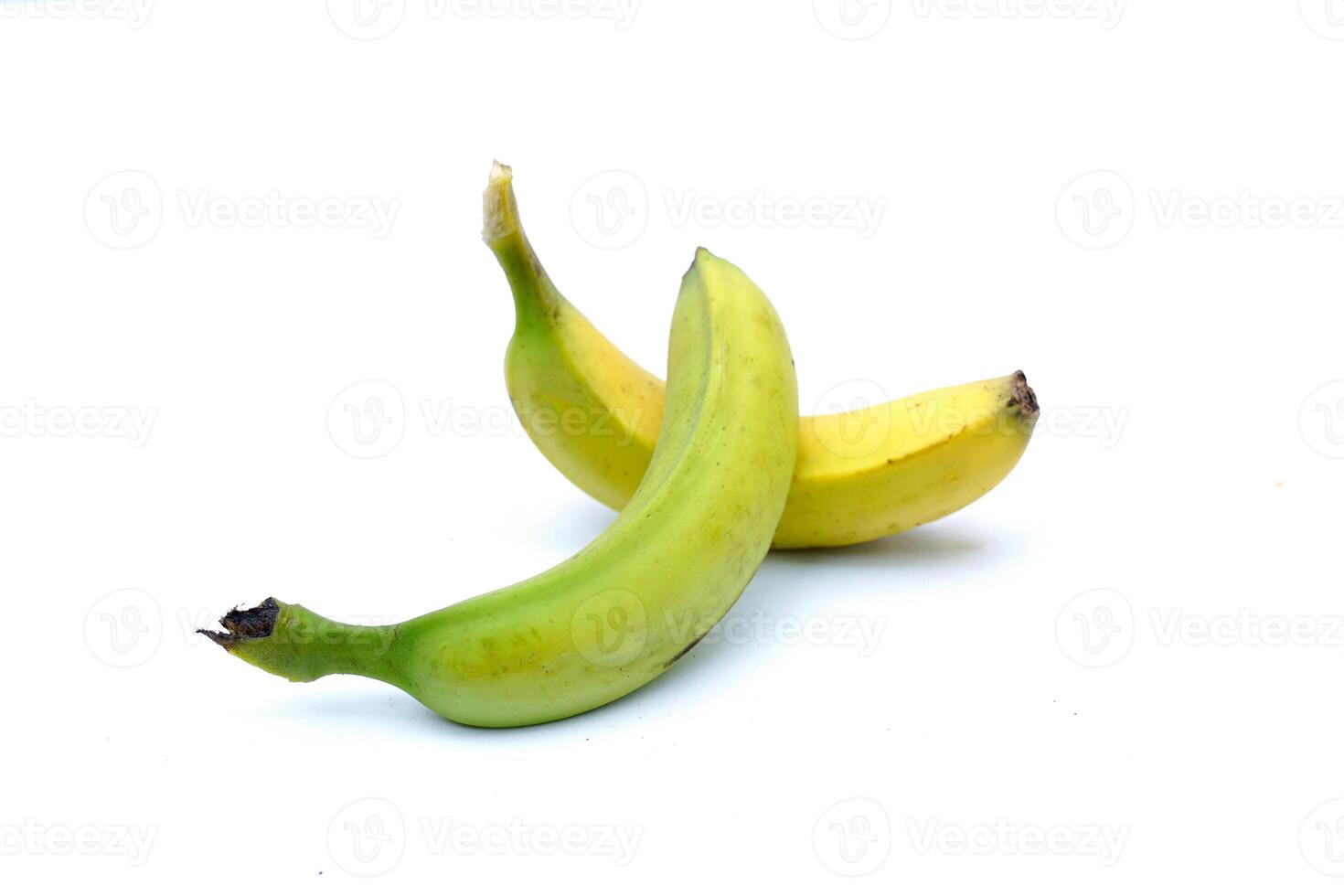 isolated Cavendish bananas on white background. It is a fruit with good taste. It has a delicious aroma. The peel is thin, not sticky. The skin color of bananas turns golden yellow when ripe. photo