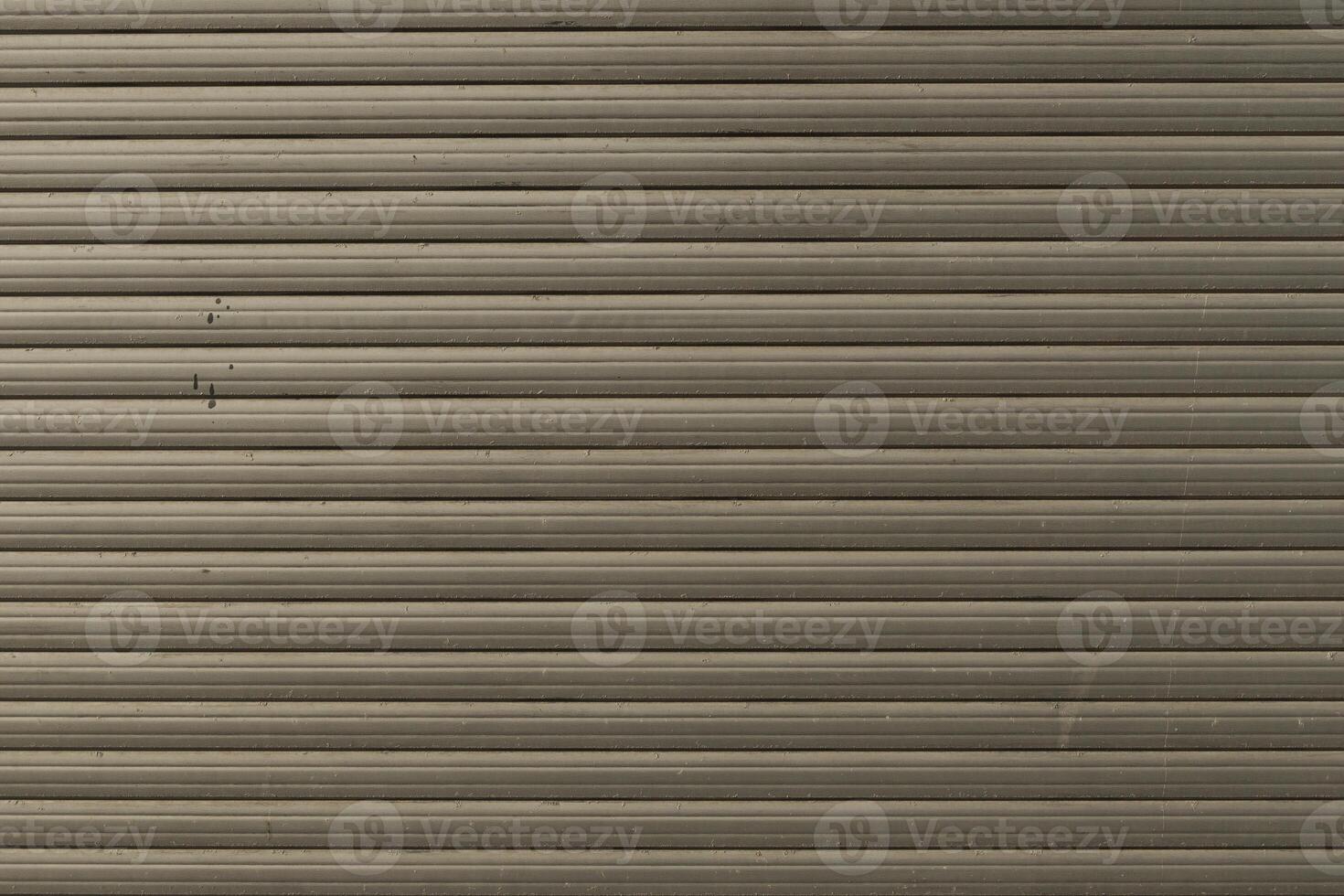 Texture of old external blinds on windows made of hard plastic. Traces of paint and age photo