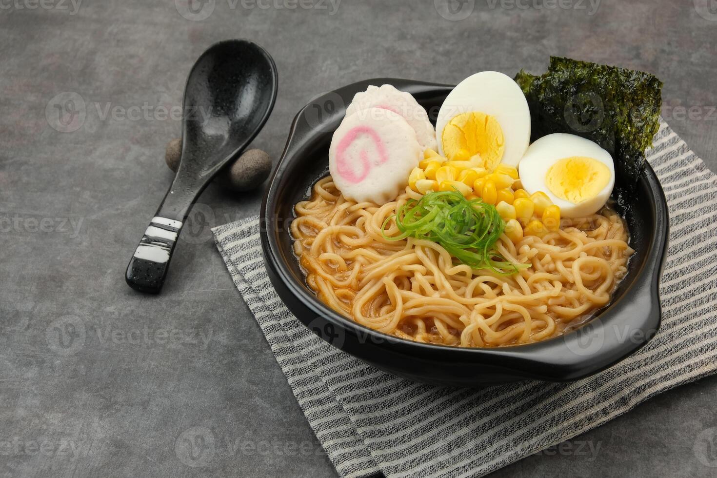 Ramen Noodles with egg and various topping photo