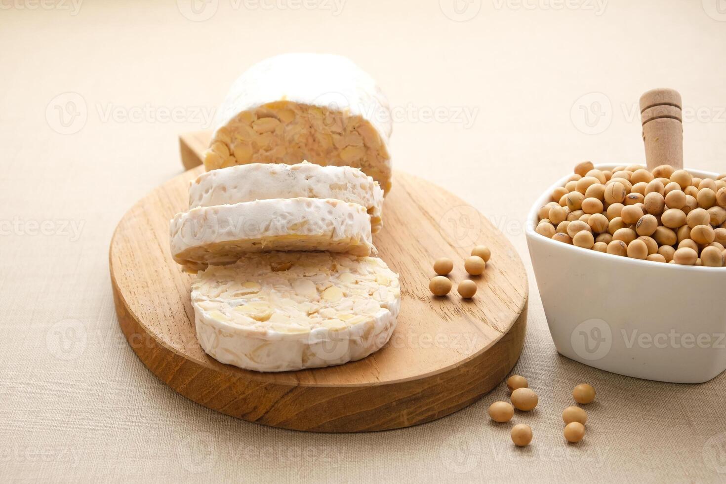 Raw Tempeh or Tempe, Indonesian traditional food, made from fermented soybeans. Usually fried for a side dish or for other cooking ingredients. photo