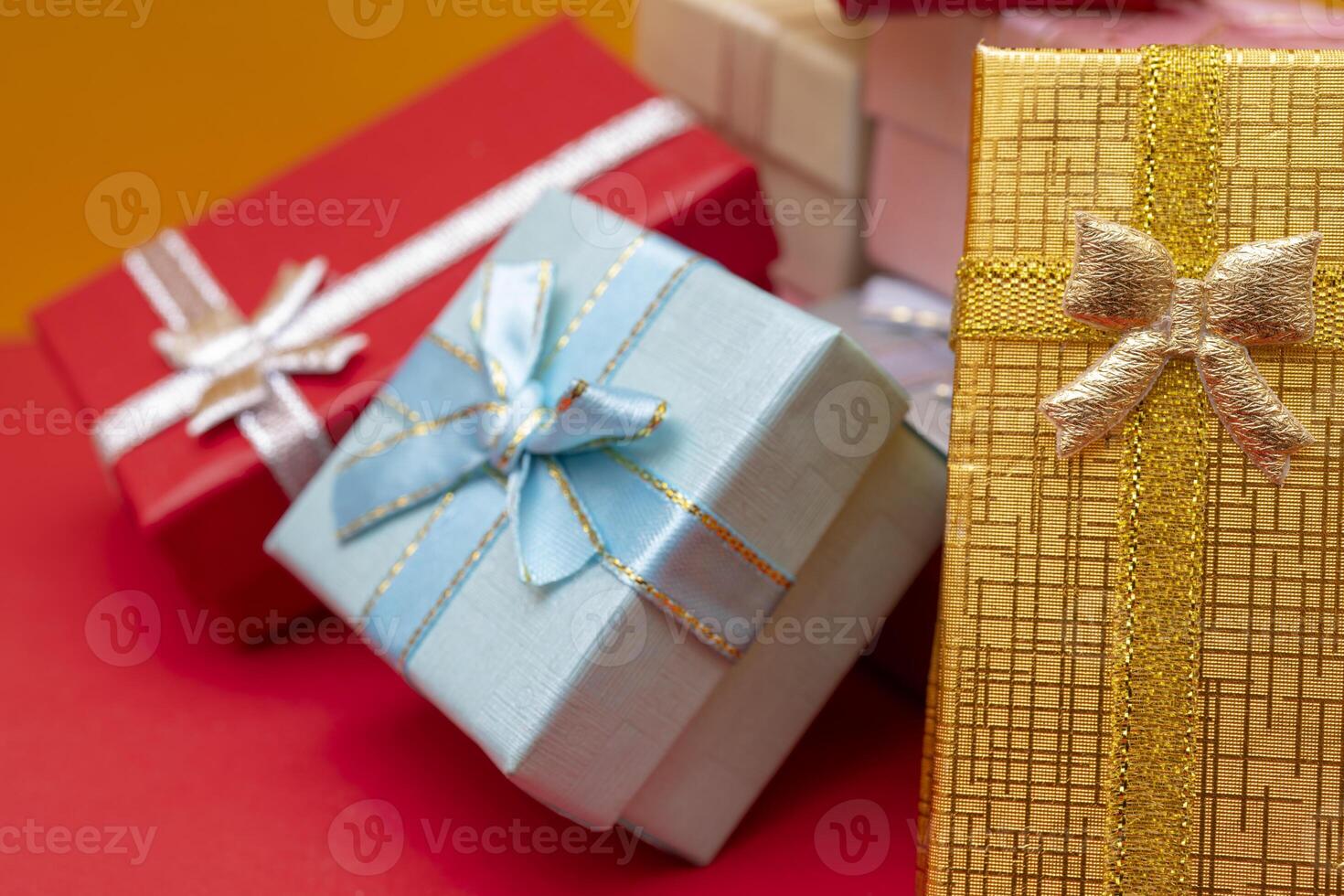 Bright gift boxes with bows. photo