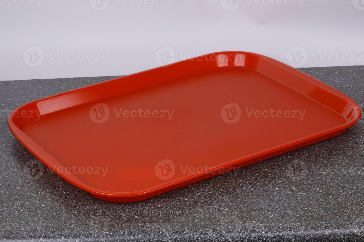Empty red tray. Copy space. photo