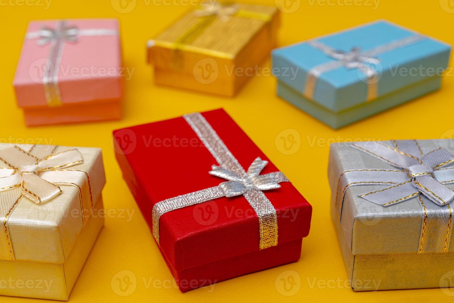 Bright gift boxes with bows. photo