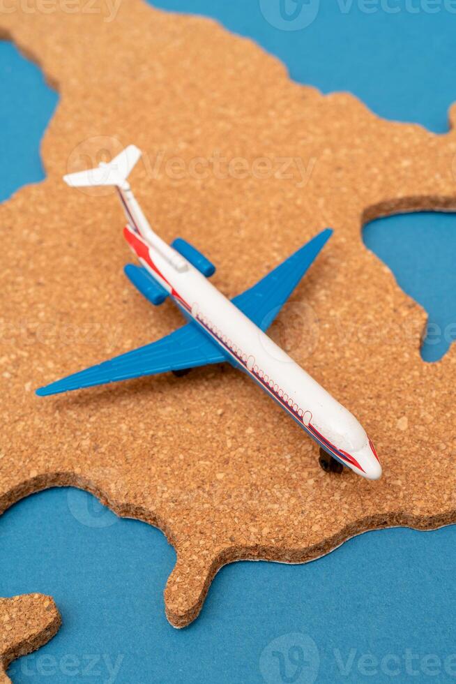 Outline of the continent America and the plane. photo