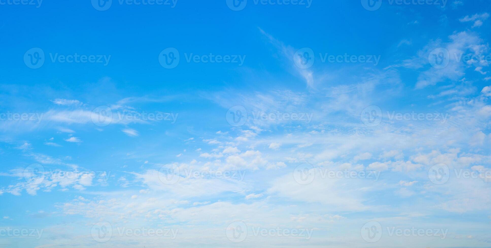 White clouds in the blue sky. Light heavenly background. Natural natural background. photo