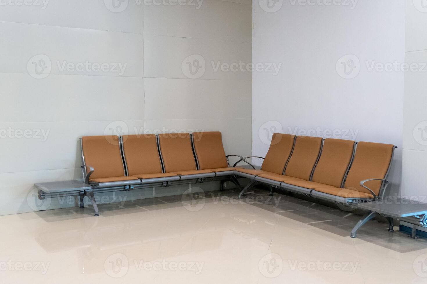 Rows of seat in airport lounge photo