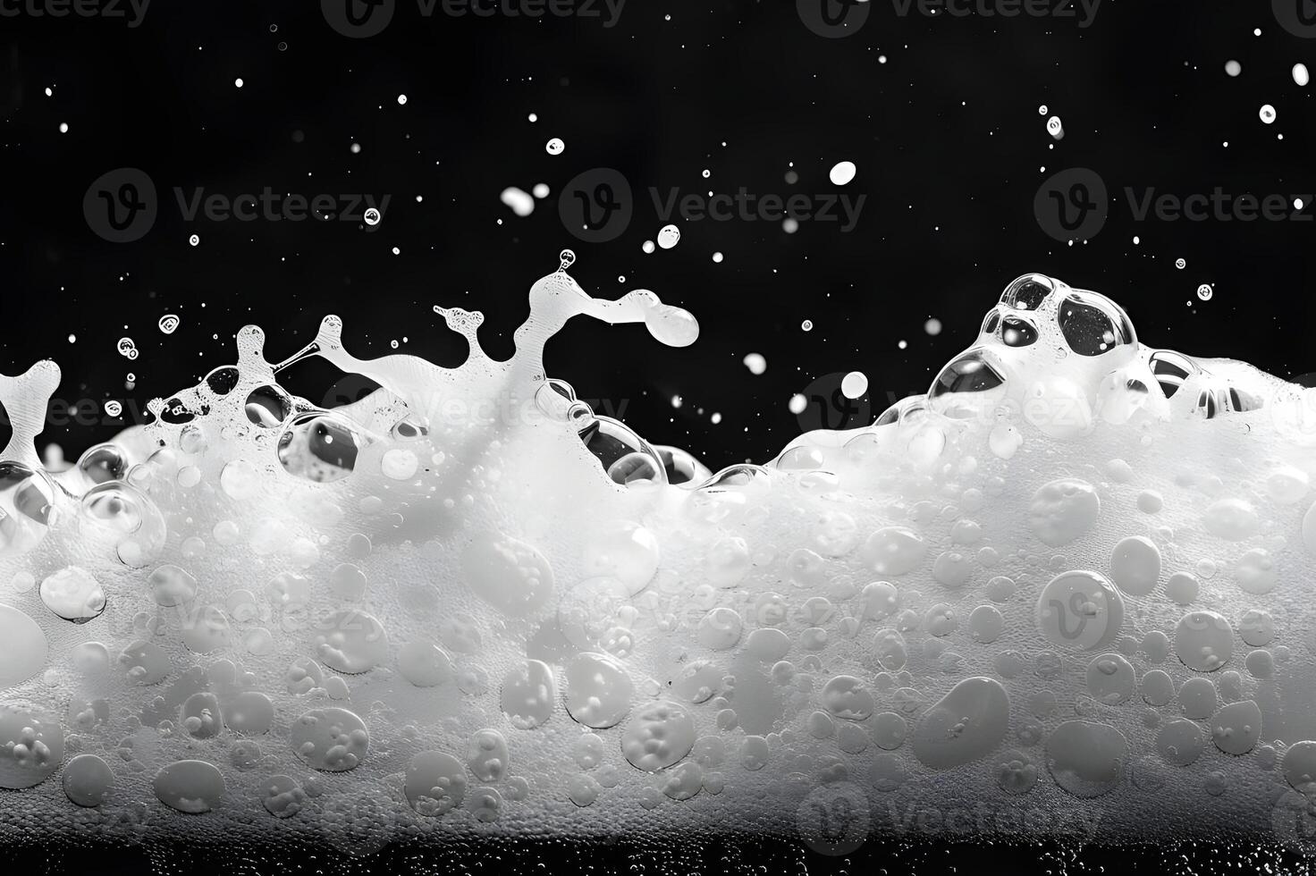 Clear macro image of water drops on black background, with hints of blue, representing fluidity and motion photo