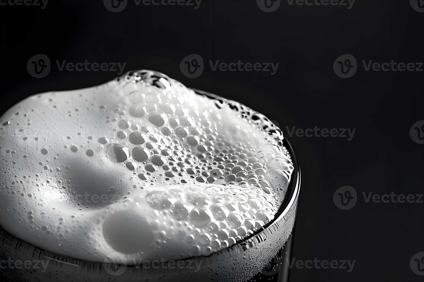 Clear macro image of water drops on black background, with hints of blue, representing fluidity and motion photo