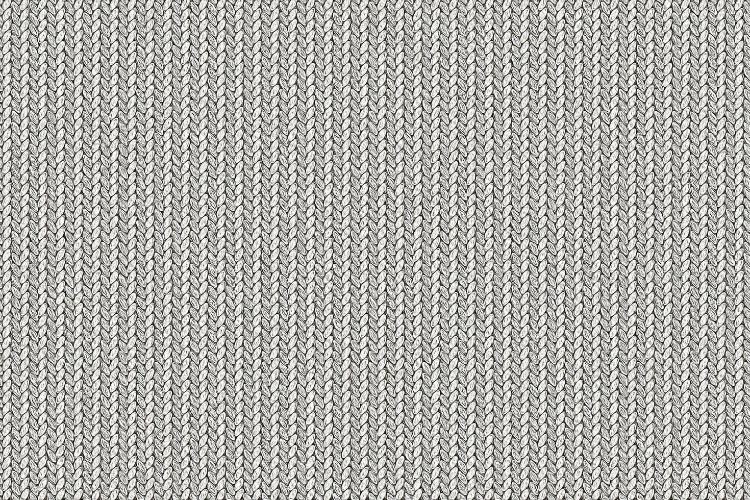 Cozy background made of woven knitted simple natural yarn in gray tones photo