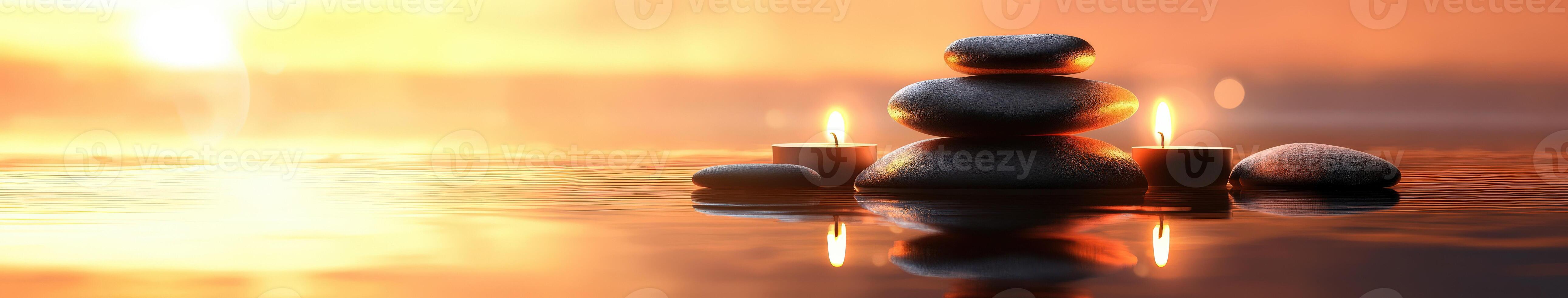 Serene zen background with candles and smooth rocks at sunset photo