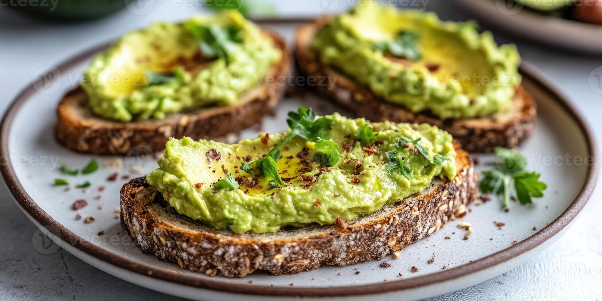 Delicious avocado hummus toast served on whole grain bread photo
