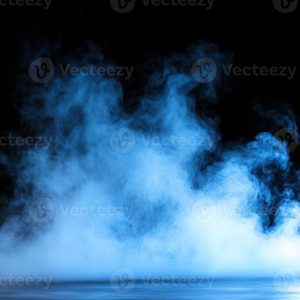 Gentle blue mist rises slowly over a calm surface in dim light photo