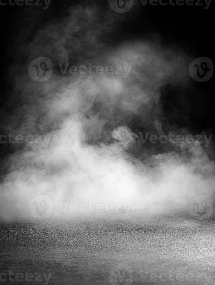 Smoke swirling across a dark background in low light conditions photo
