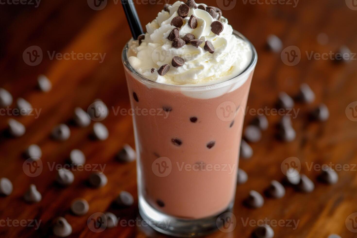 Delicious ice cream drink topped with whipped cream and chocolate chips photo